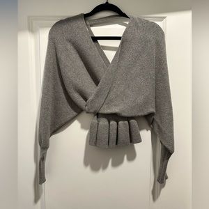 Gray v-neck sweater in sized medium purchased from local boutique